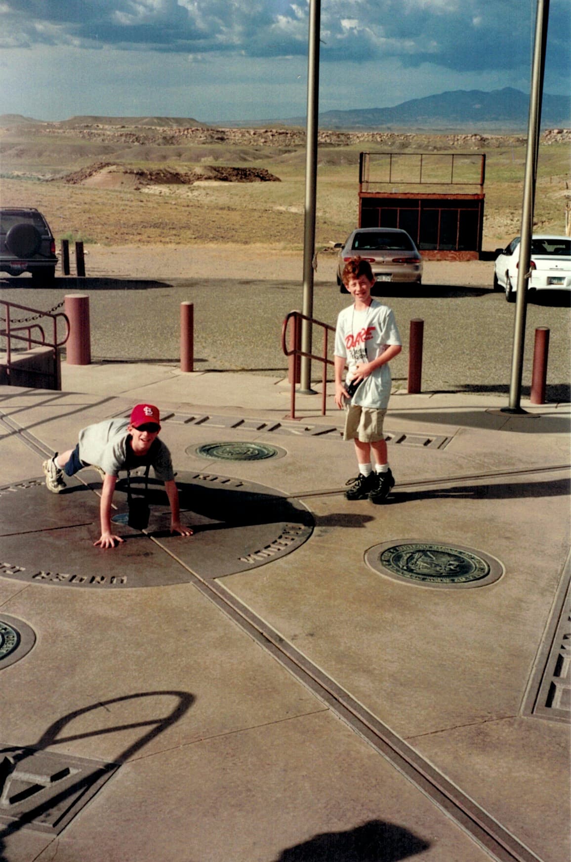 Matt Convente and Mike Convente posting at Four Corners Monument.